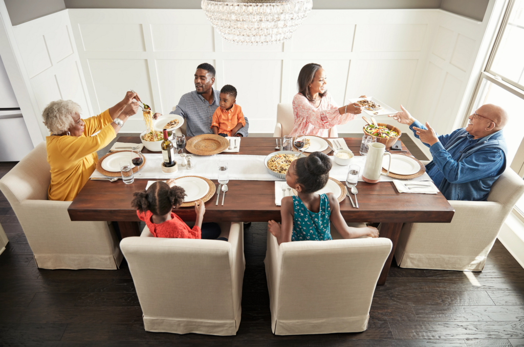 Happy family enjoying Breakfast | Bob's Carpet and Flooring