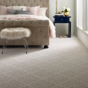 New patterned carpet in a traditional bedroom