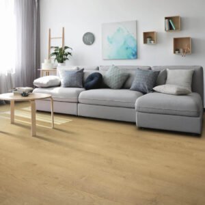 Bright family room with new laminate floors and a grey sofa