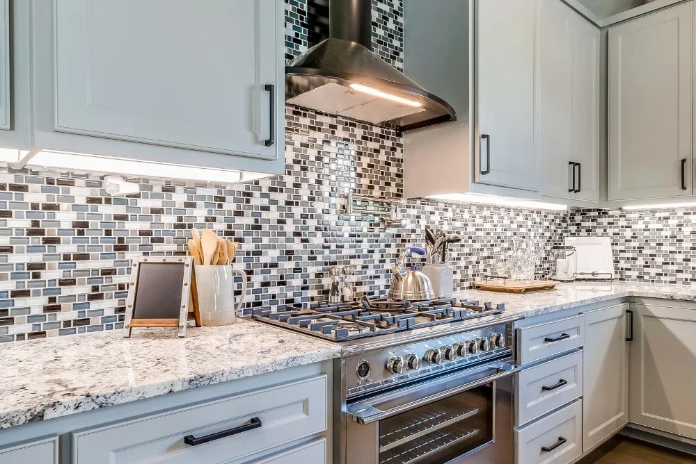 Glass tile backsplash in contemporary kitchen